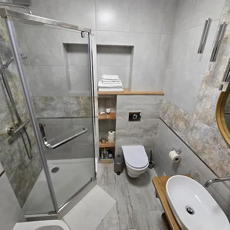 Апартаменты Zacisze Pod Reglami & Sauna